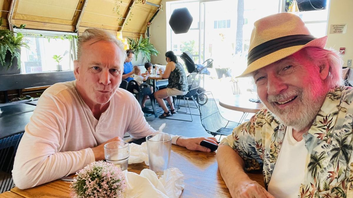 Joseph at lunch with a friend